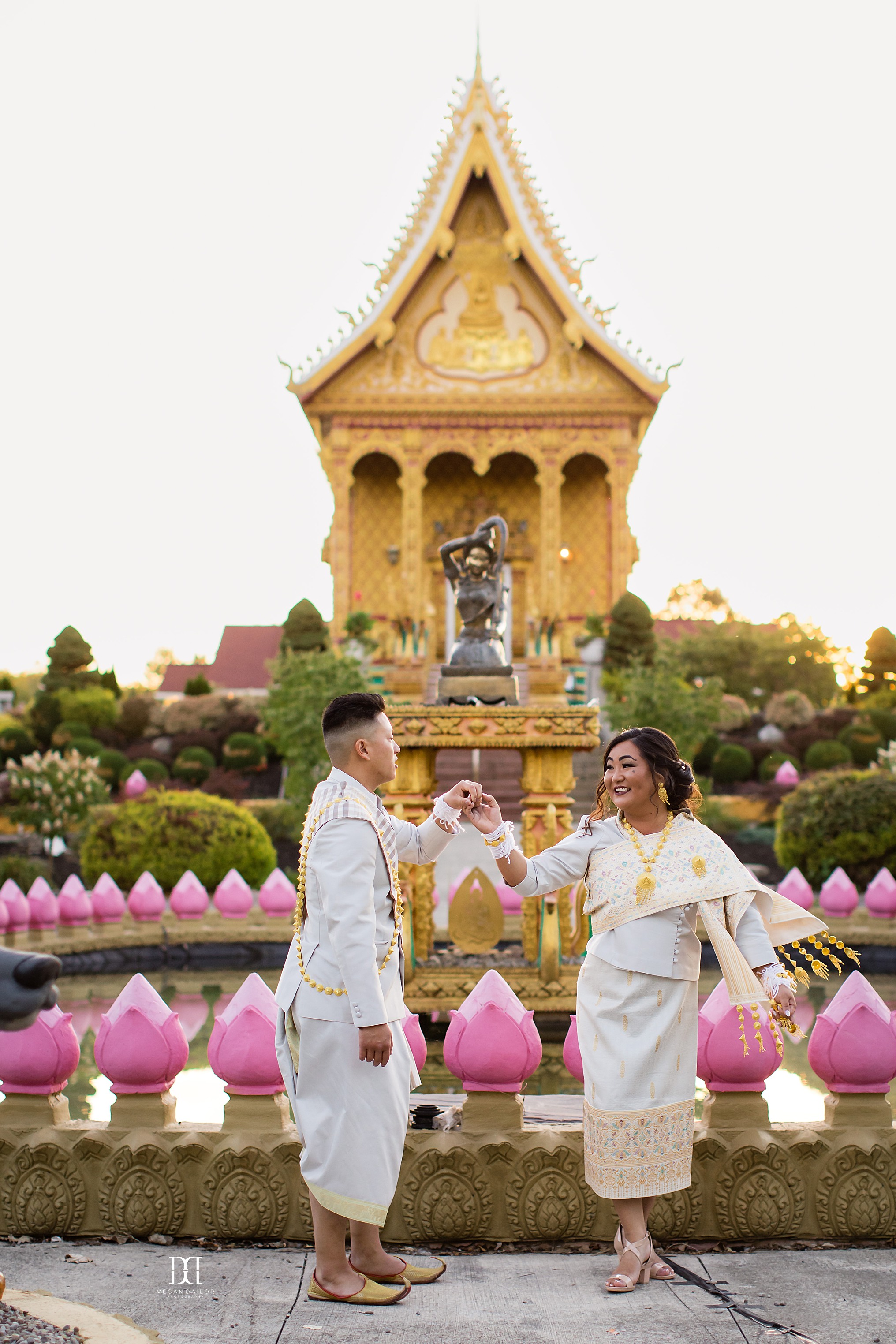 bride and groom at buddhist temple rochester photographers