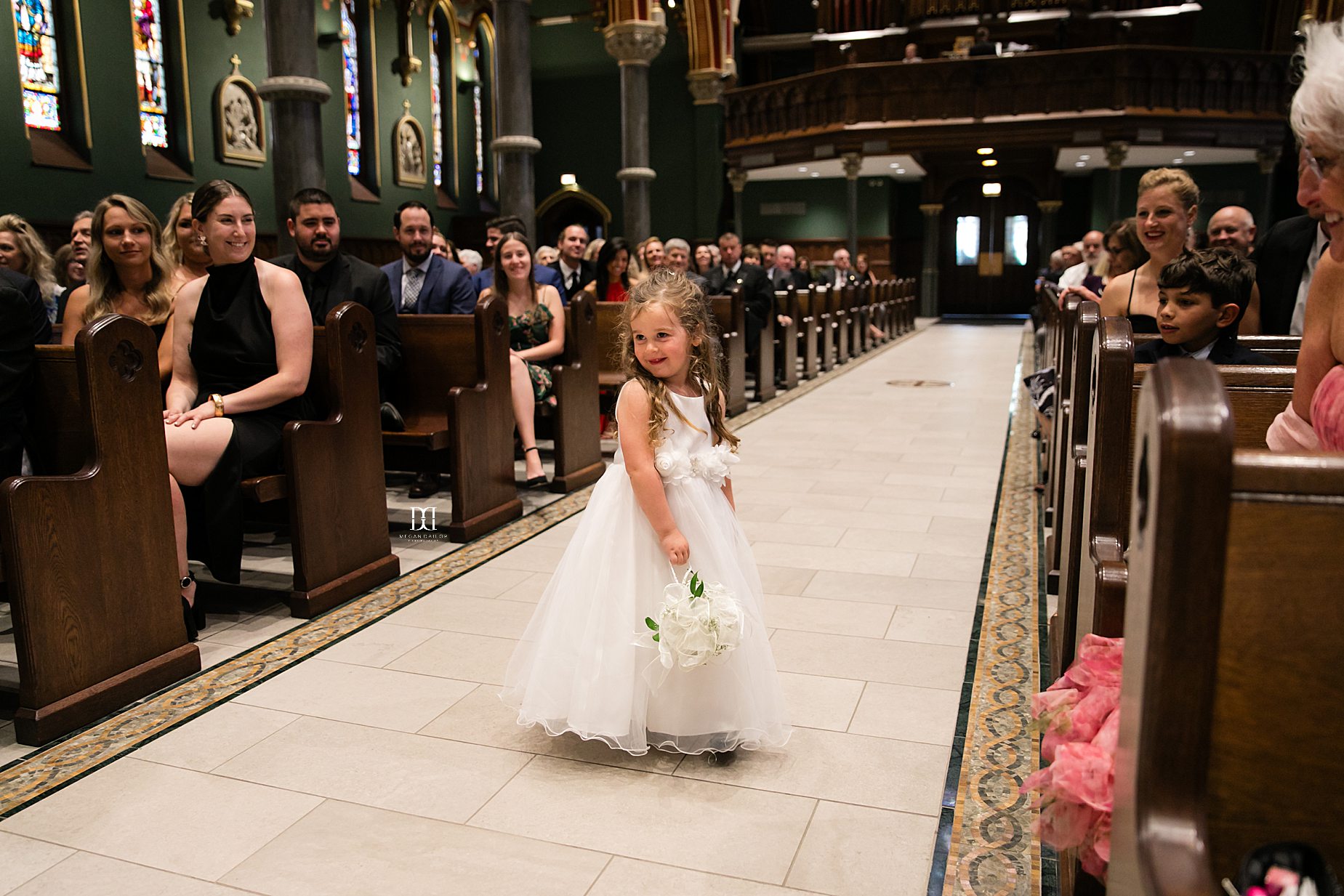 flower girl swishing dress. Syracuse wedding photographers