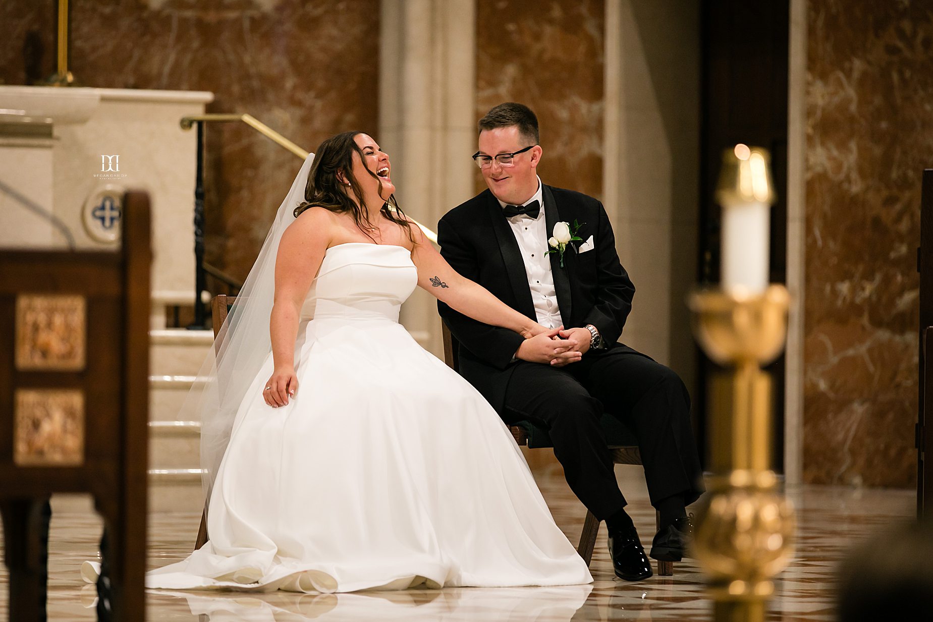 bride and groom laughing during wedding ceremony. Syracuse wedding photographers