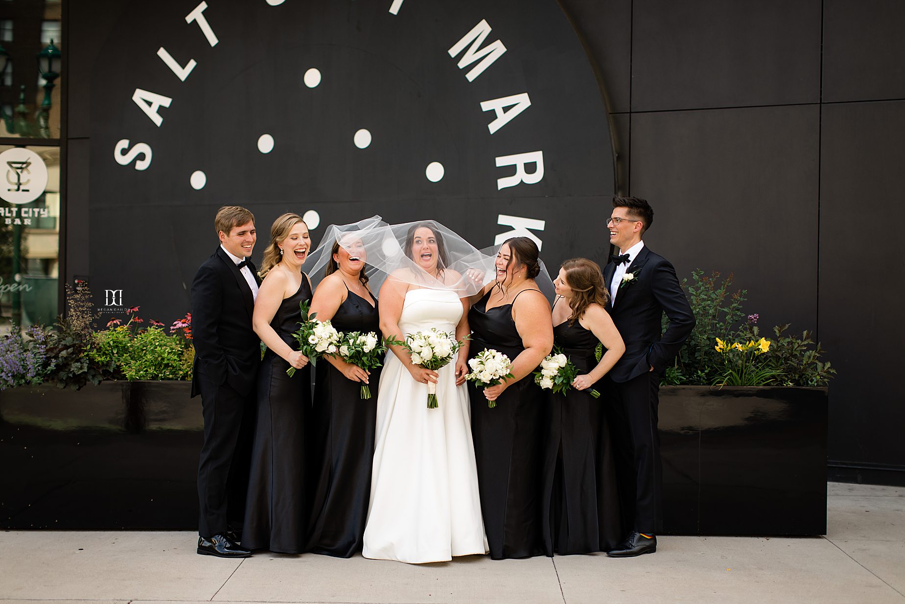 wedding party photos at salt city market. Syracuse wedding photographers